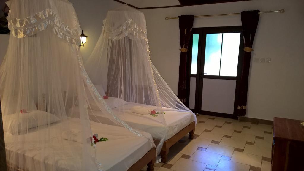 Etoile Labrine Guest House La Digue Quarto foto